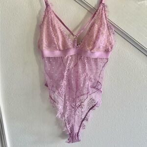 FREE Purple Shapewear with Intricate Lace Detailing with a $400 purchase.